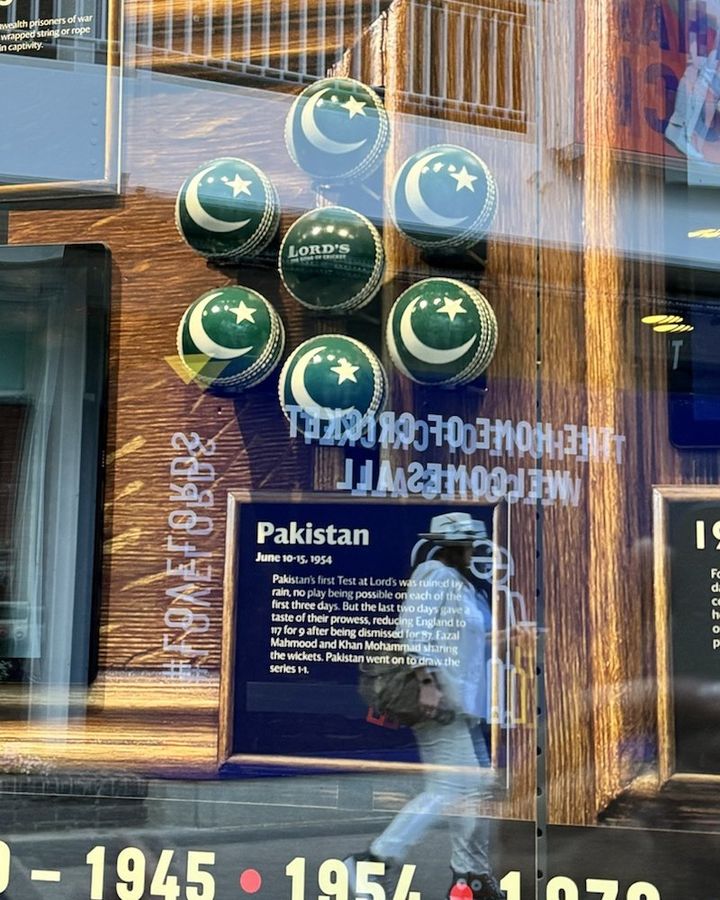 A display at Lord's of green Pakistan cricket balls above a panel on Pakistan's first Test there in 1954.